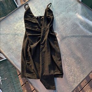 Black shiny short dress with cross over flap